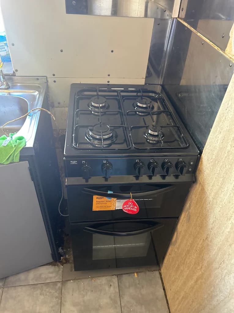 Gas cooker connected and safety checked in a kitchen