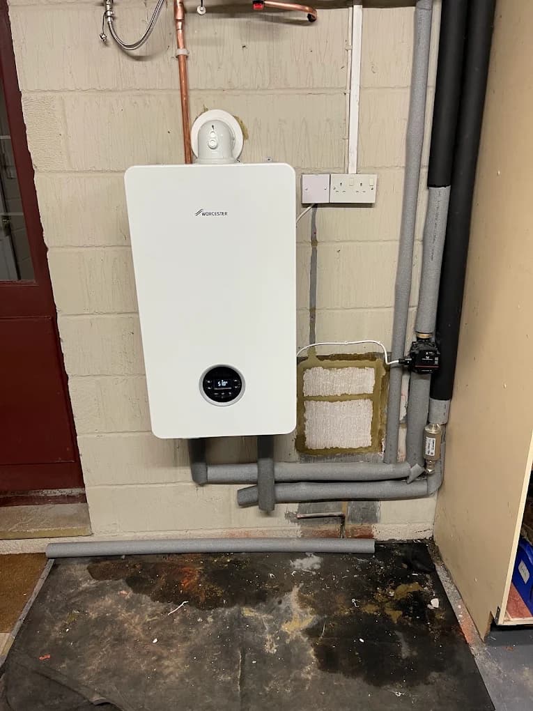 Worcester boiler installed in a garage utility space