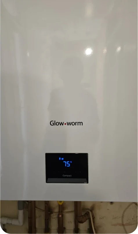 New Glow-worm combi boiler with digital display fitted to the wall