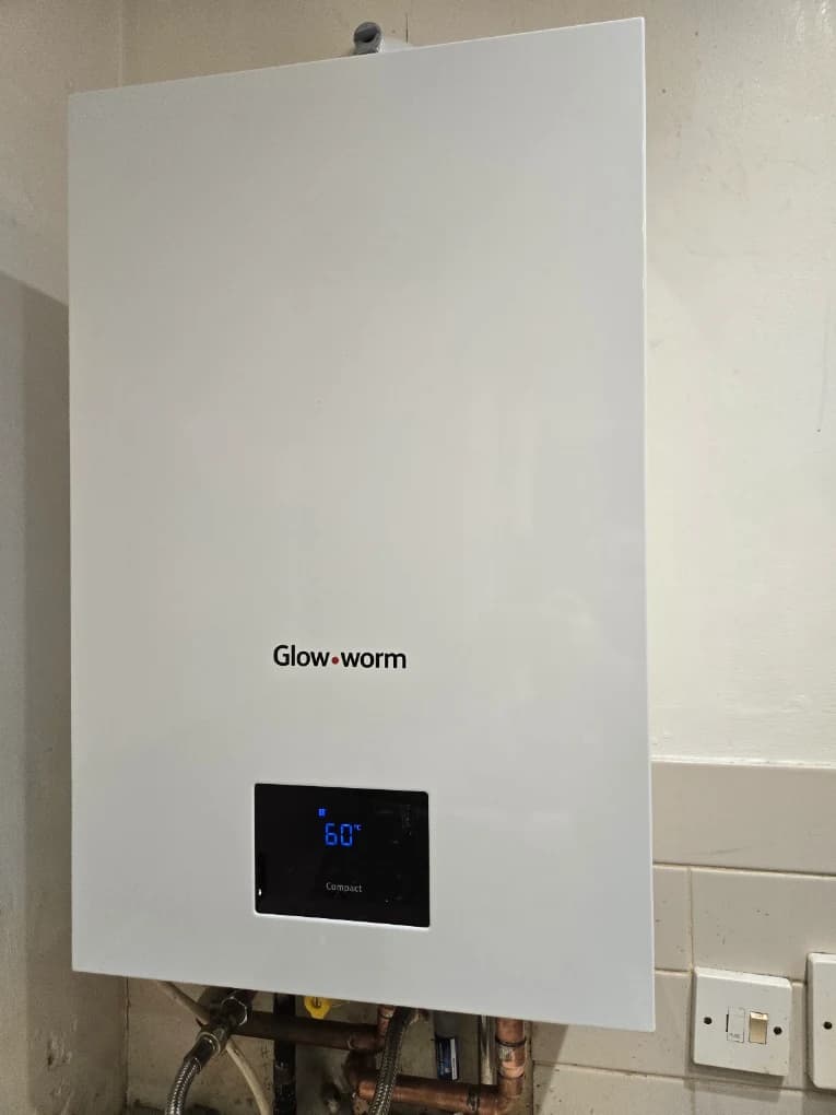 Glow-worm combi boiler installed on a clean wall